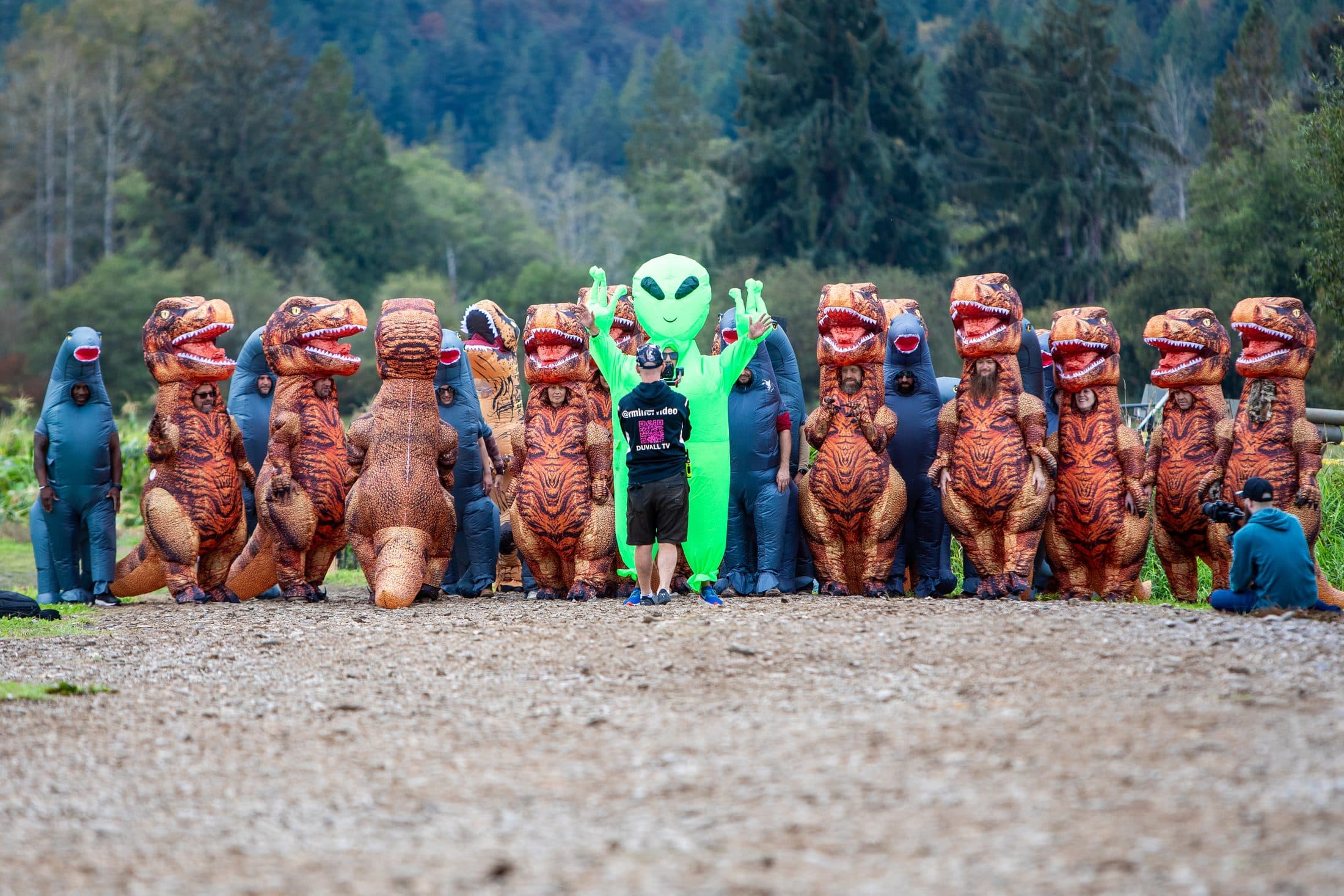 Buddy Buck with friends in dinosaur costumes in Duvall